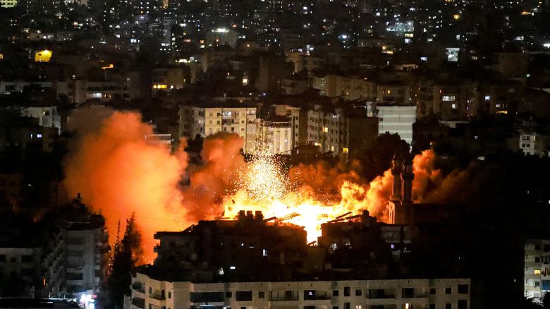 Smoke and fire erupt from the site of an Israeli airstrike on Beirut's southern suburbs on June 5.