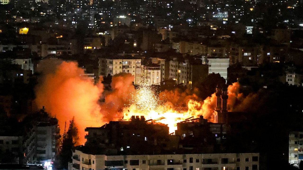 Smoke and fire erupt from the site of an Israeli airstrike on Beirut's southern suburbs on June 5.