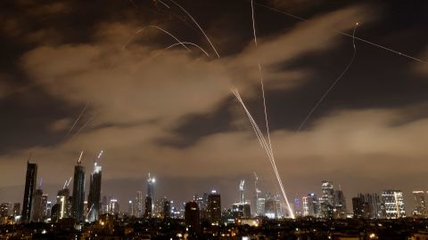 Israeli air defense systems intercept Iranian missiles over the Israeli city of Tel Aviv early on June 15.
