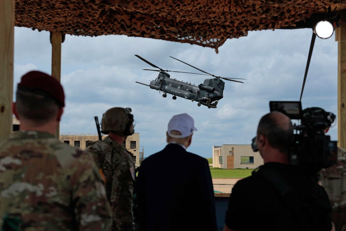 President Donald Trump watches a demonstration by Special Operations soldiers at the Holland Drop Zone on June 10 in Fort Bragg, North Carolina.
