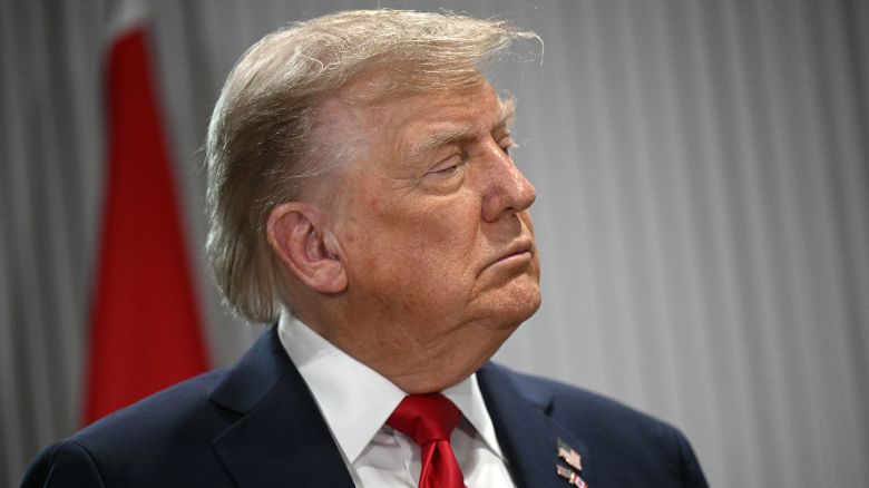 President Donald Trump looks on as Canadian Prime Minister Mark Carney speaks as they meet during the Group of Seven Summit at the Pomeroy Kananaskis Mountain Lodge in Kananaskis, Alberta, Canada on June 16.
