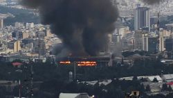 Smoke rises after a reported Israeli strike on a building used by Islamic Republic of Iran News Network, part of Iran's state TV broadcaster, on June 16, in Tehran, Iran.
