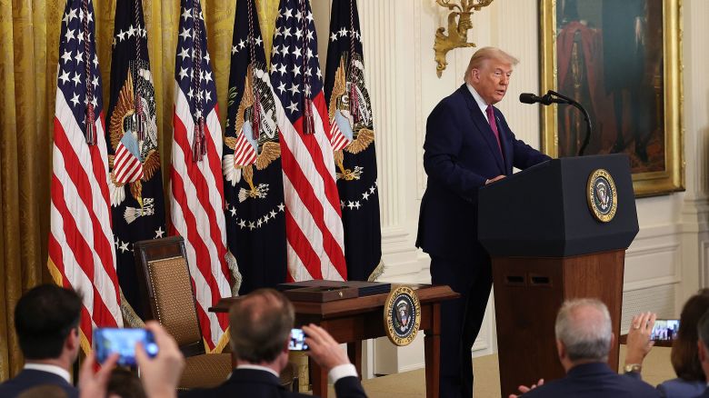 President Donald Trump delivers remarks before signing a series of bills related to California’s vehicle emissions standards during an event in the East Room of the White House on June 12 in Washington, DC.
