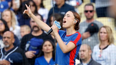 Nezza sings the national anthem in Spanish before a baseball game between the Los Angeles Dodgers and San Francisco Giants at Dodger Stadium on June 14 in Los Angeles.