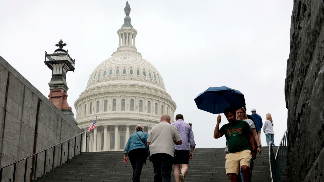 Tourists walk near the US Capitol visitor center on June 16 in Washington, DC.