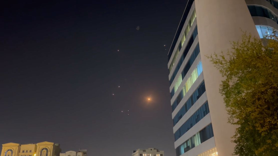 In this frame-grab made from video, missiles and air-defense interceptors illuminate the night sky over Doha after Iran launched an attack on US forces at Al Udeid Air Base on June 23 in Doha, Qatar.
