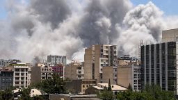 Smoke rises from a location allegedly Islamic Revolutionary Guard Corps' Sarallah Headquarters in north of Tehran on June 23.