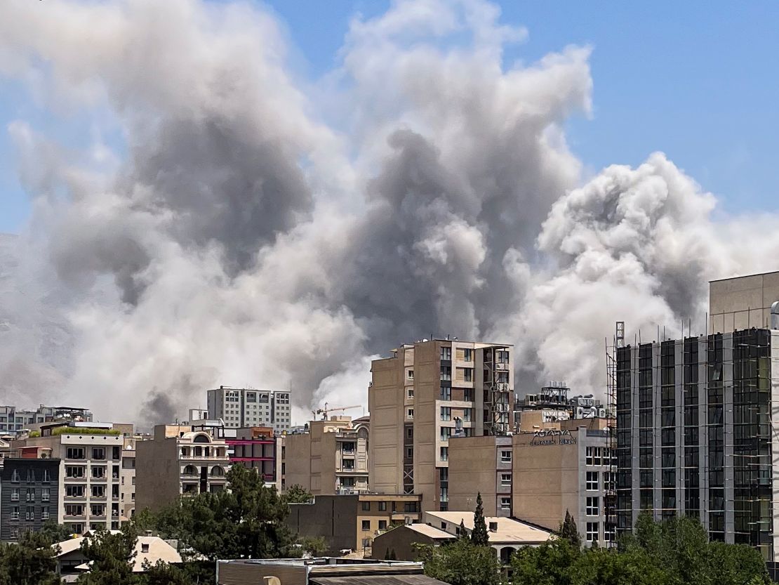 Smoke rises from a location allegedly Islamic Revolutionary Guard Corps' Sarallah Headquarters north of Tehran on June 23.