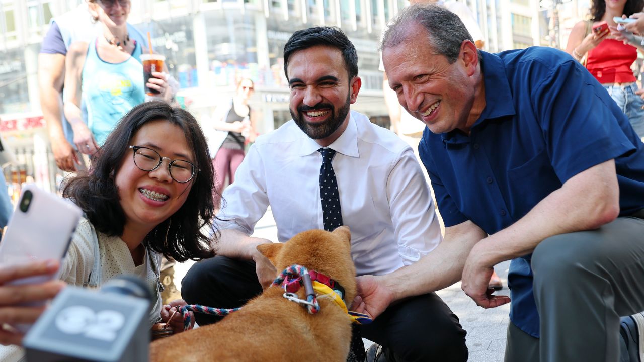 Zohran Mamdani greets voters with NYC Comptroller and Mayoral Candidate Brad Lander on Broadway on June 24 in New York City.