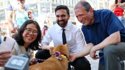 Zohran Mamdani greets voters with NYC Comptroller and Mayoral Candidate Brad Lander on Broadway on June 24 in New York City.