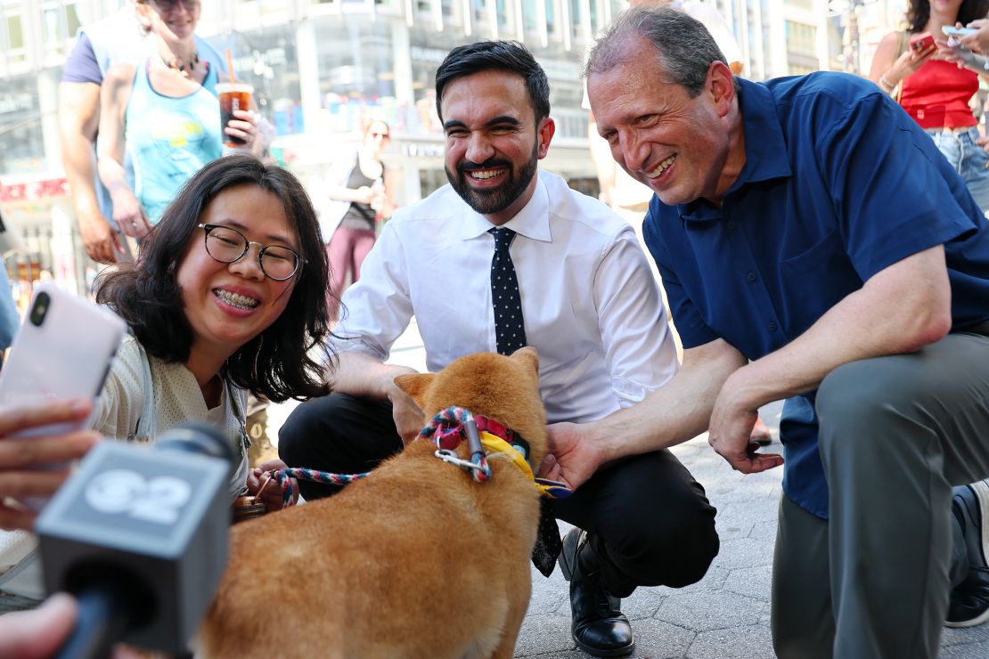 Zohran Mamdani greets voters with NYC Comptroller and Mayoral Candidate Brad Lander on Broadway on June 24 in New York City.
