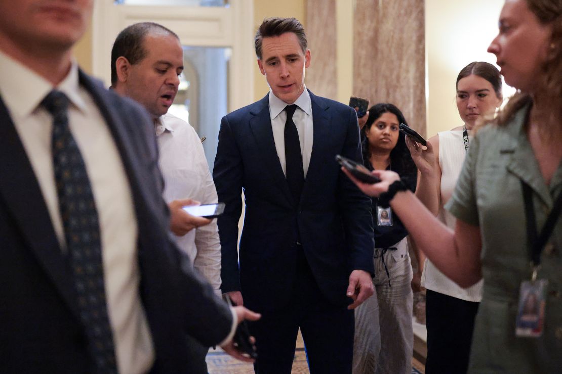 Sen. Josh Hawley speaks to reporters before meeting with Republican lawmakers to discuss US President Donald Trump's