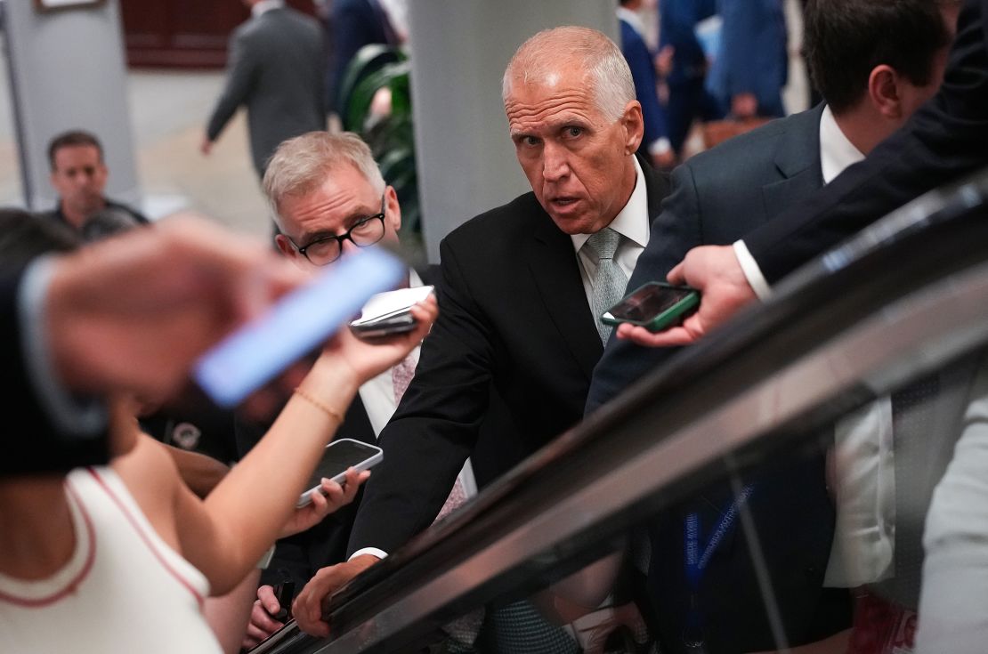 Sen. Thom Tillis talks to reporters as he walks to the Senate Chamber at the US Capitol on June 25 in Washington, DC.
