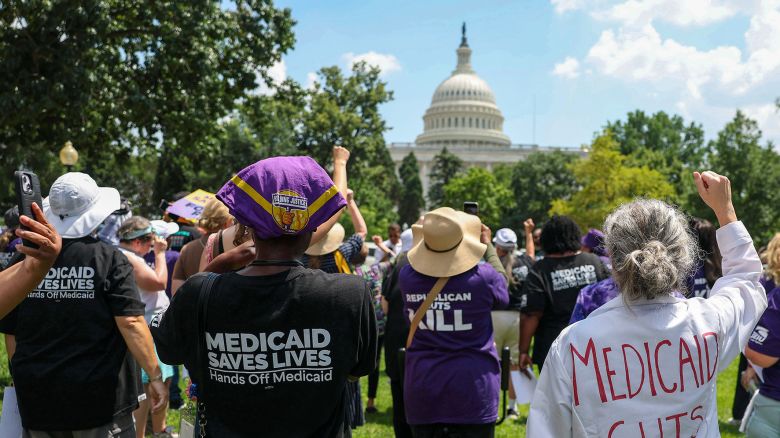 Workers with the Service Employees International Union rally outside the US Capitol on June 26 in Washington, DC.