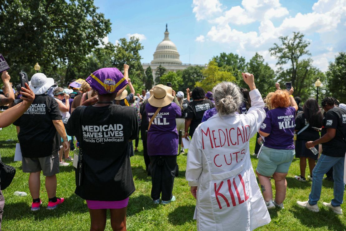 Workers with the Service Employees International Union rally outside the US Capitol on June 26 in Washington, DC.