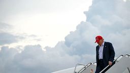 President Donald Trump steps off Air Force One upon arrival at Joint Base Andrews, Maryland, on July 1.