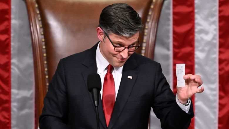 House Speaker Mike Johnson shows the final tally of the vote on President Donald Trump's tax bill on the floor of the House of Representatives at the US Capitol in Washington, DC, on July 3.