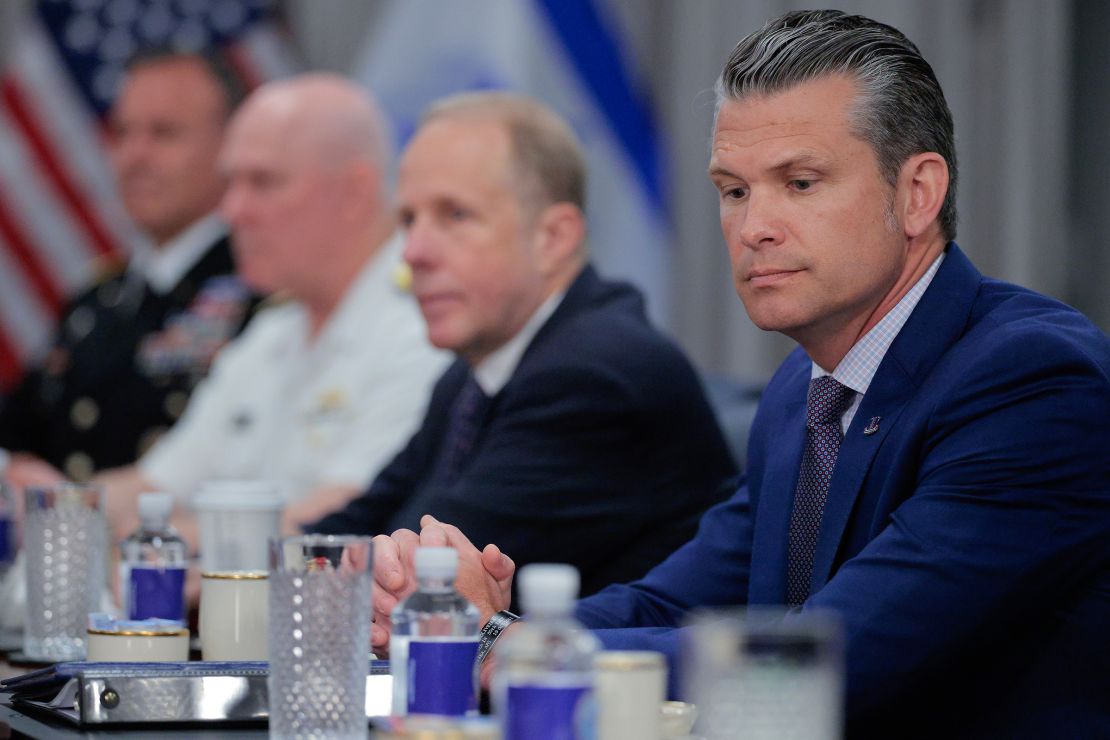 Secretary of Defense Pete Hegseth sits down at the Pentagon on July 9, in Arlington, Virginia.