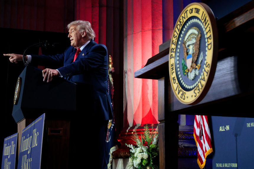 President Donald Trump gestures as he speaks during the "Winning the AI Race" summit hosted by All‑In Podcast and Hill & Valley Forum at the Andrew W. Mellon Auditorium on July 23 in Washington, DC. 