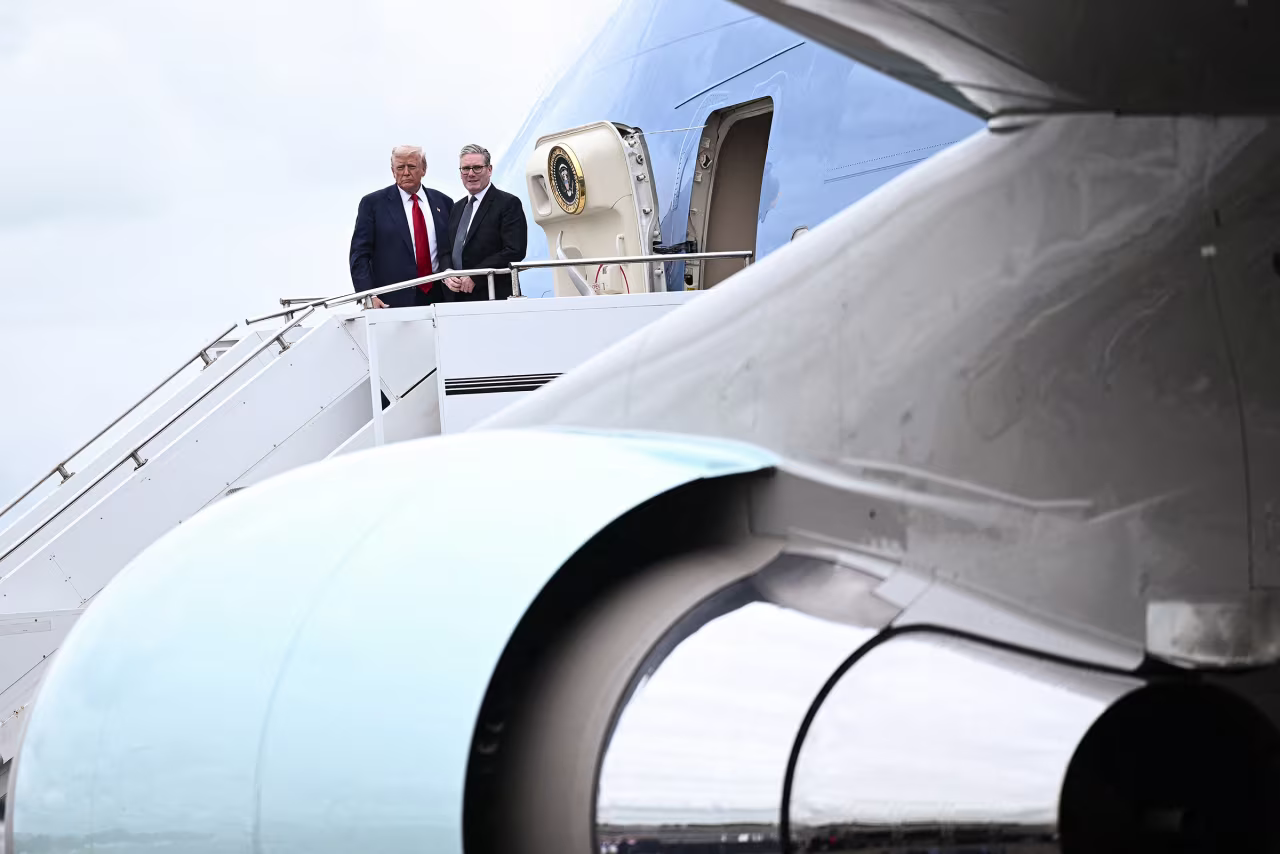 US President Donald Trump and Britain's Prime Minister Keir Starmer board Air Force One in Glasgow, Scotland on July 28.