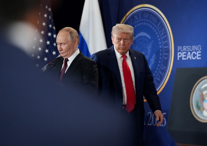 Russian President Vladimir Putin and US President Donald Trump arrive for a press conference during their August summit in Anchorage, Alaska.