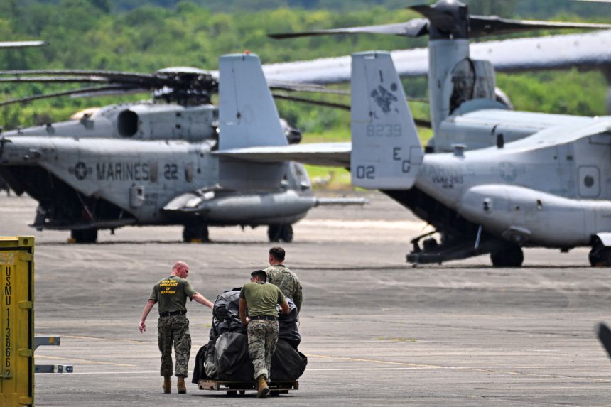 Members of the US Marine Corps, Marine Fighter Attack Squadron 225, work at José Aponte de la Torre Airport, formerly Roosevelt Roads Naval Station, on September 13, in Ceiba, Puerto Rico.