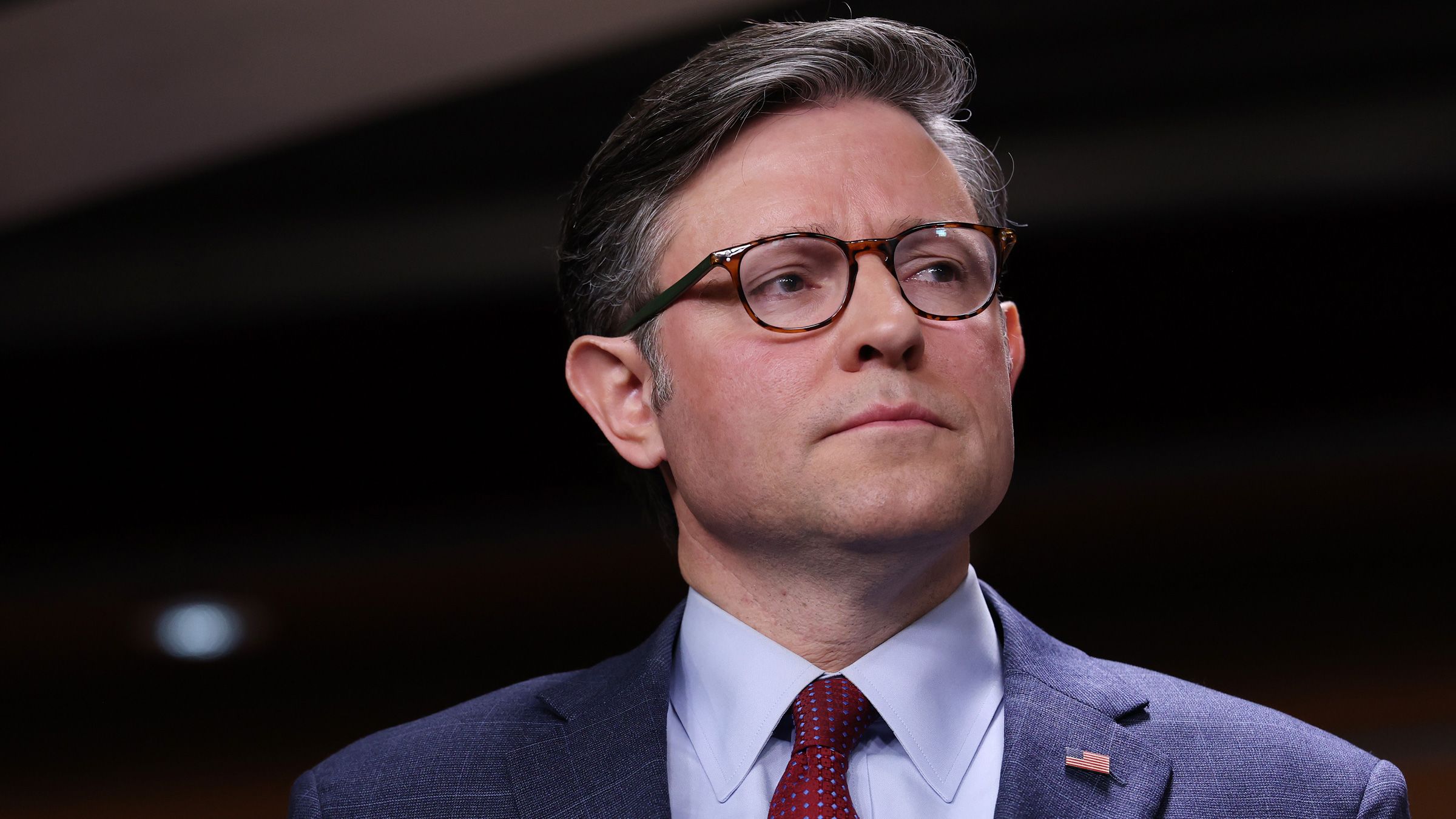 Speaker of the House Mike Johnson (R-LA) listens during a news conference on the government shutdown at the U.S. Capitol on October 22, 2025 in Washington, DC. The government shutdown has entered its 22nd day.