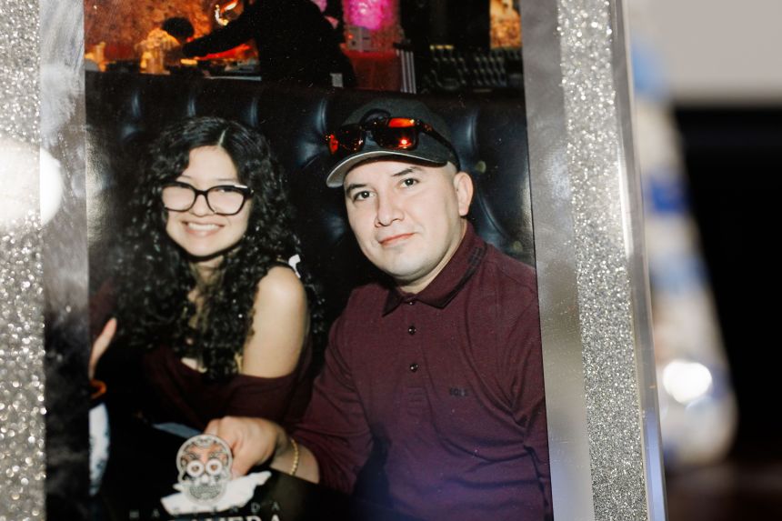 A photo of Ofelia Torres and her father, Ruben Torres Maldonado, is on display in the family's living room.