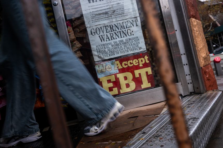A store displays a sign accepting Electronic Benefits Transfer cards for Supplemental Nutrition Assistance Program purchases for groceries on Thursday in New York City.
