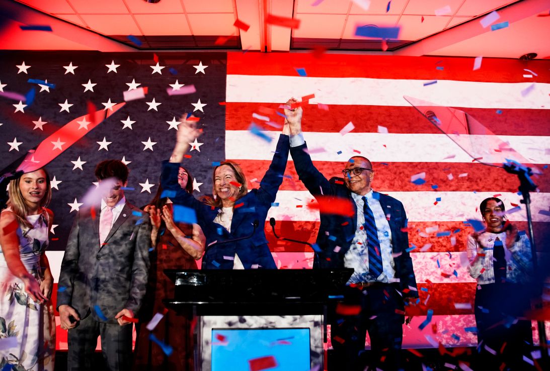 New Jersey Democratic gubernatorial candidate Rep. Mikie Sherrill celebrates with lieutenant gubernatorial candidate Dale Caldwell after their win during an election night watch party in East Brunswick, New Jersey, on Tuesday.