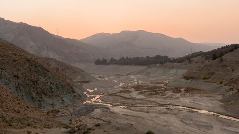 The receding waters of Latyan Dam reveal a dry riverbed near Tehran, Iran, on November 10, 2025. The reservoir, which supplies part of the capital's drinking water, has seen a sharp decline due to prolonged drought and rising demand in the Tehran region. (Photo by Bahram / Middle East Images via AFP) (Photo by BAHRAM/Middle East Images/AFP via Getty Images)          