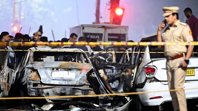 Teams from the National Security Guard (NSG), National Investigation Agency (NIA), forensic department and Delhi team investigate the site where a blast occurred near the Red Fort, on November 10, 2025 in New Delhi, India.
