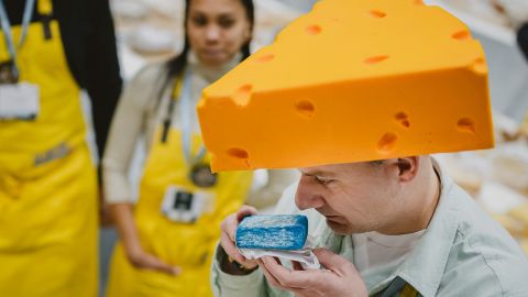 Kuba Maziarczyk, super jury member and Polish cheese maker smells a piece of cheese during the 37th edition of the World Cheese Awards, organised by the Guild of Fine Food, in Bern, on November 13, 2025. With up to 5000 participating cheeses from around 50 countries, the World Cheese Awards is the biggest cheese event in the world. An international jury of around 250 people assesses various aspects of the cheeses, such as the appearance of the rind and paste, as well as the aroma and texture of the cheese.