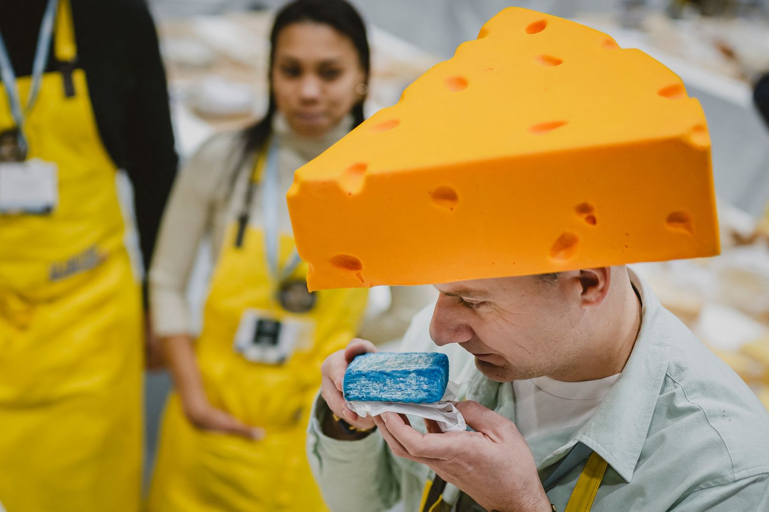 Kuba Maziarczyk sniffs a piece of cheese during the <a href="index.php?page=&url=https%3A%2F%2Fwww.cnn.com%2F2025%2F11%2F13%2Ftravel%2Fworlds-best-cheese-2025-gruyere-switzerland">World Cheese Awards</a> in Bern, Switzerland, on Thursday, November 13. Maziarczyk was part of the jury that assessed various aspects of cheeses from dozens of countries.
