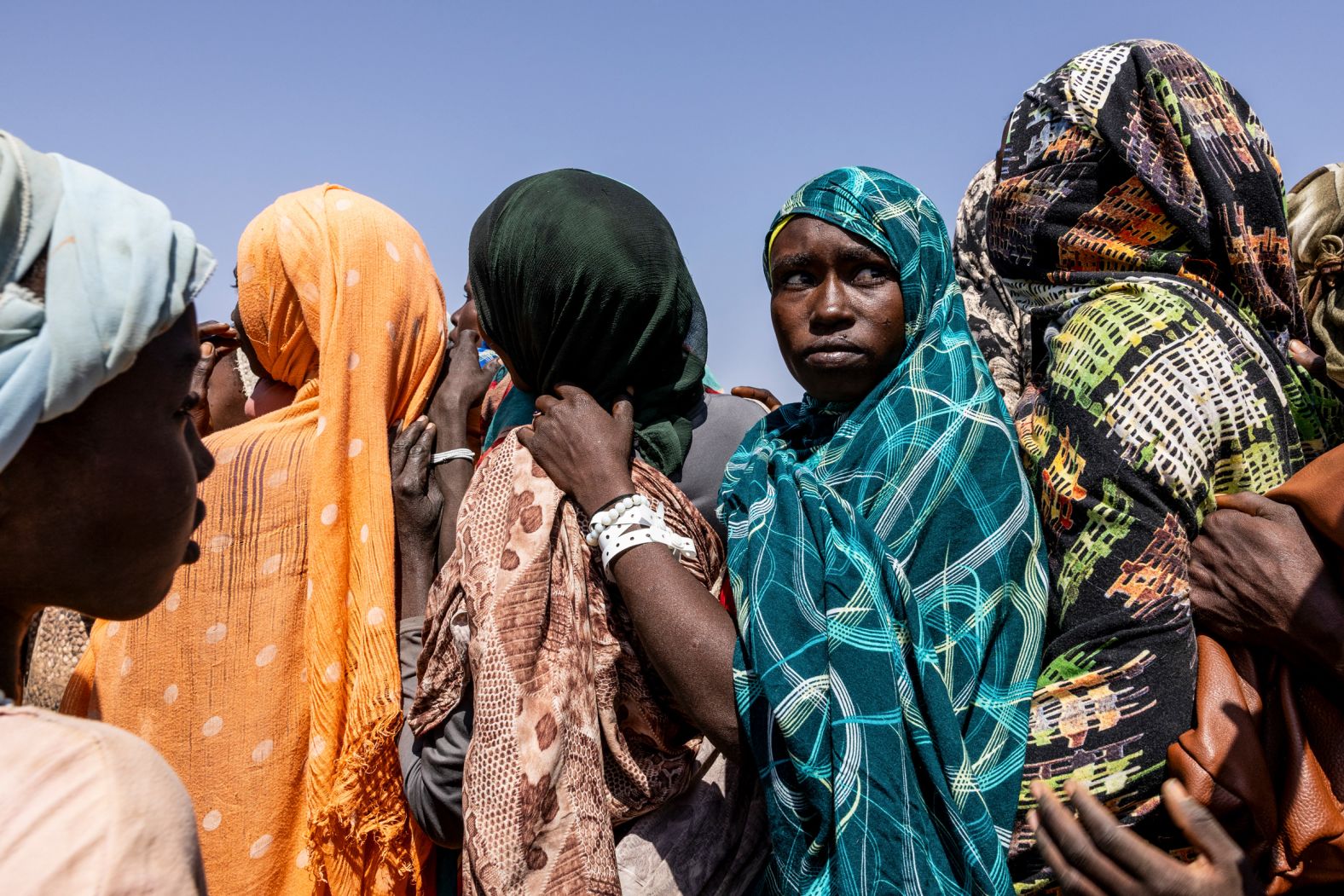 Sudanese refugees, fleeing the country’s <a href="index.php?page=&url=https%3A%2F%2Fwww.cnn.com%2F2025%2F11%2F07%2Fafrica%2Fsudan-conflict-foreign-influence-intl-cmd">civil war</a>, line up at a registration area in neighboring Chad on Thursday, November 13.