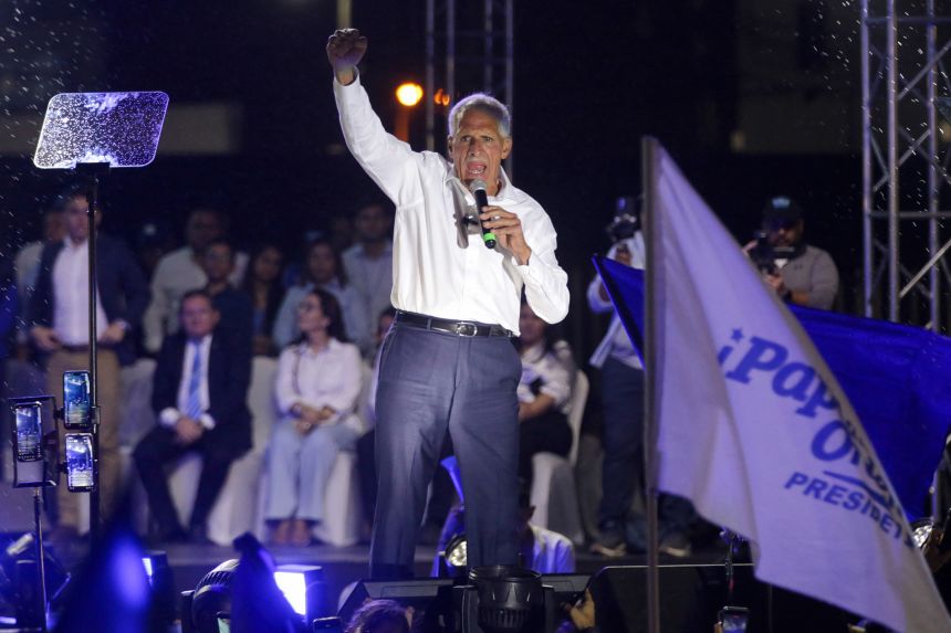Honduran presidential candidate and businessman Nasry Asfura, of the National Party, speaks during his campaign closing rally in Tegucigalpa on November 22.
