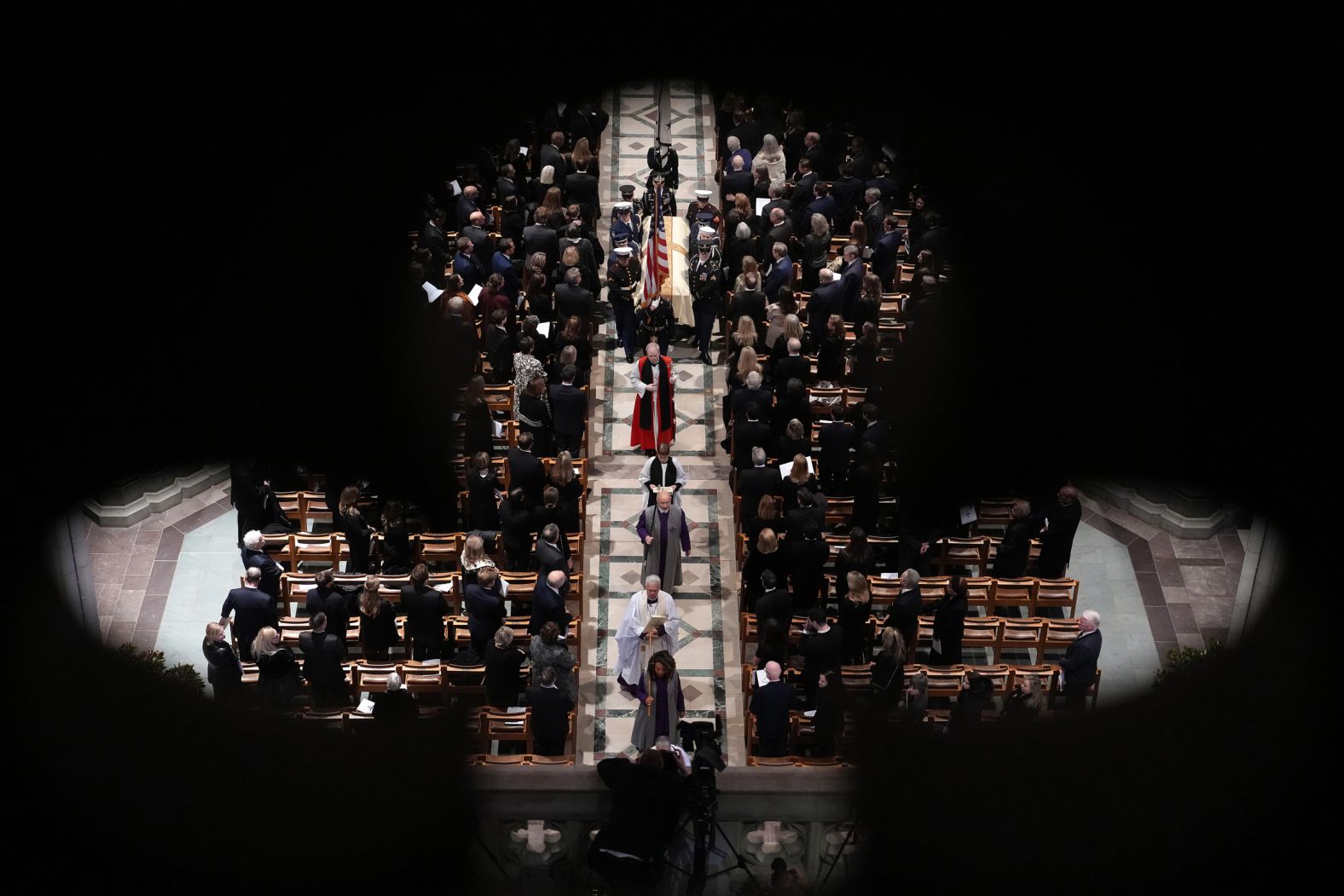 A casket containing the remains of former Vice President Dick Cheney is carried out of the National Cathedral in Washington, DC, during <a href="index.php?page=&url=https%3A%2F%2Fwww.cnn.com%2F2025%2F11%2F20%2Fpolitics%2Fdick-cheney-funeral-washington">his funeral</a> on Thursday, November 20. Cheney, who died November 3 at the age of 84, received full military honors at the invitation-only memorial service. Former Presidents Joe Biden and George W. Bush were in attendance, as were former Vice Presidents Kamala Harris, Mike Pence, Al Gore and Dan Quayle.