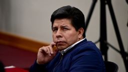 Peru's former President (20212022) Pedro Castillo gestures in the courtroom of the National Police Special Operations Directorate (DINOES) as the verdict is issued in his trial in Lima on November 27, 2025. A Peruvian court on Thursday sentenced former left-wing president Pedro Castillo to 11 years and five months in prison for trying to disband Congress and rule by decree in December 2022. (Photo by ERNESTO BENAVIDES / AFP via Getty Images)