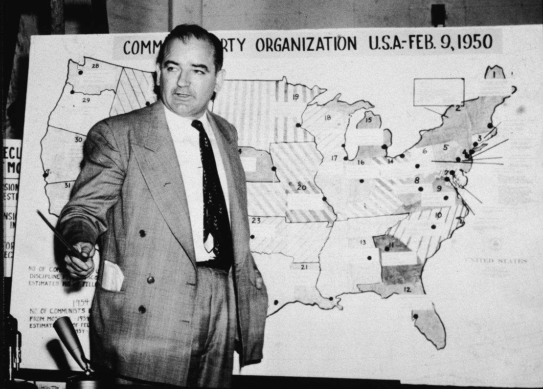 Sen. Joseph McCarthy, standing in front of a map that he said shows communist activity in the United States, testifies during the Army-McCarthy hearings in Washington, DC, in June 1954.