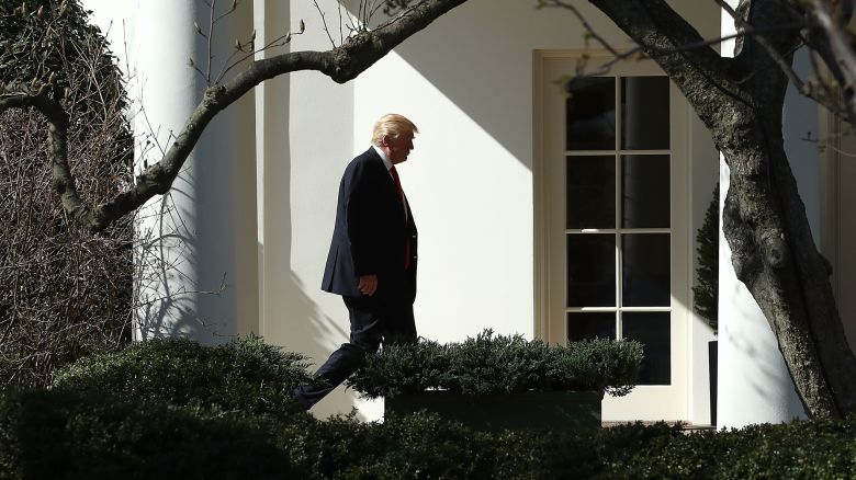 In this 2017 photo, President Donald Trump walks to the Oval Office after arriving back at the White House.