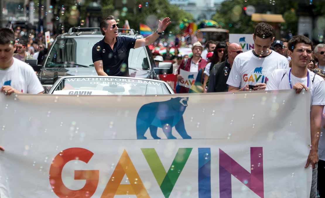 Lieutenant Governor of California Gavin Newsom waves to a crowd during the San Francisco Pride parade in San Francisco, California in June 2017.