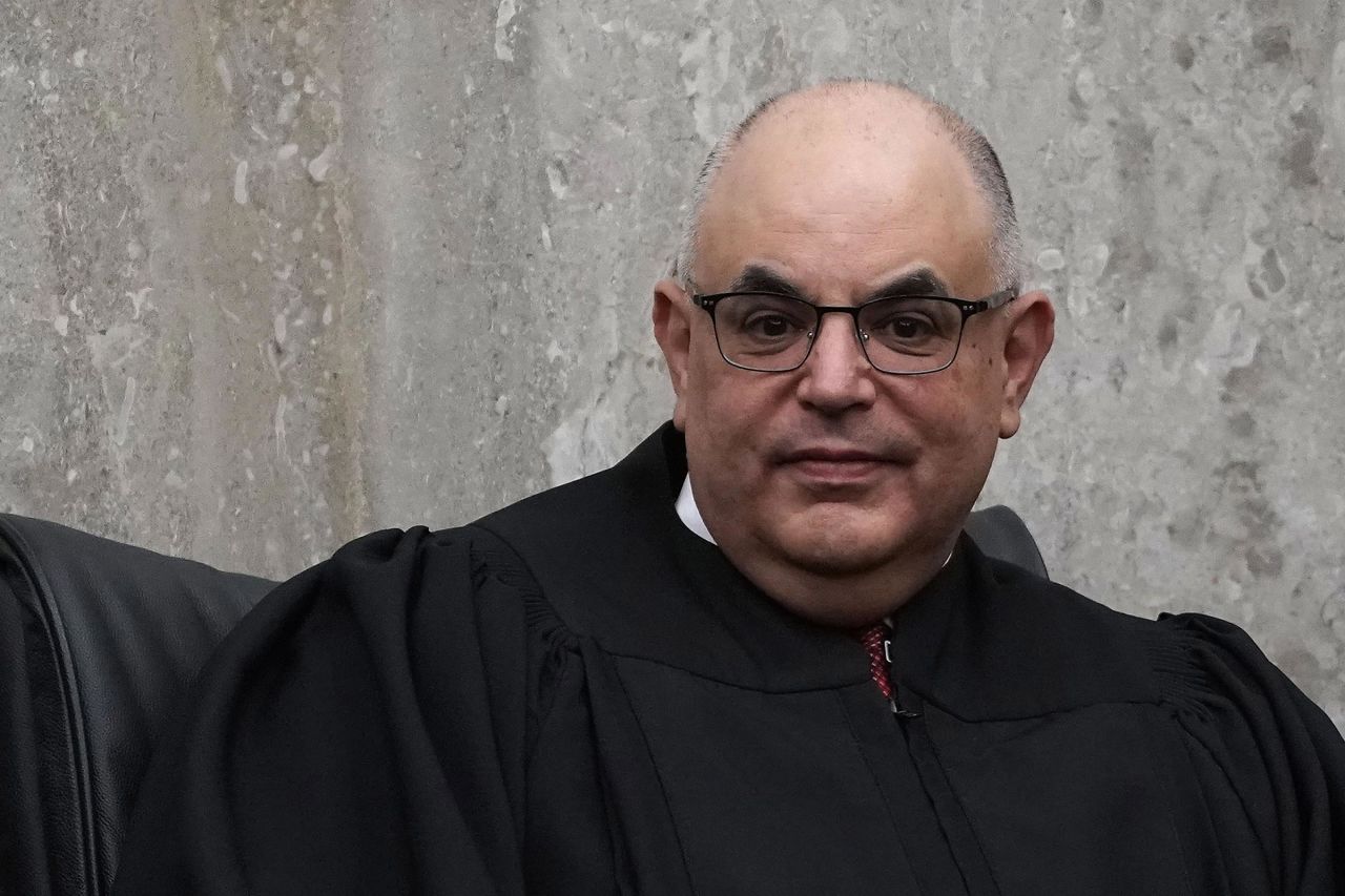 In this April 2018 photo, US District Judge Rudolph Contreras listens during the investiture ceremony for US District Judge Trevor N. McFadden at the U.S. District Court in Washington, DC. 