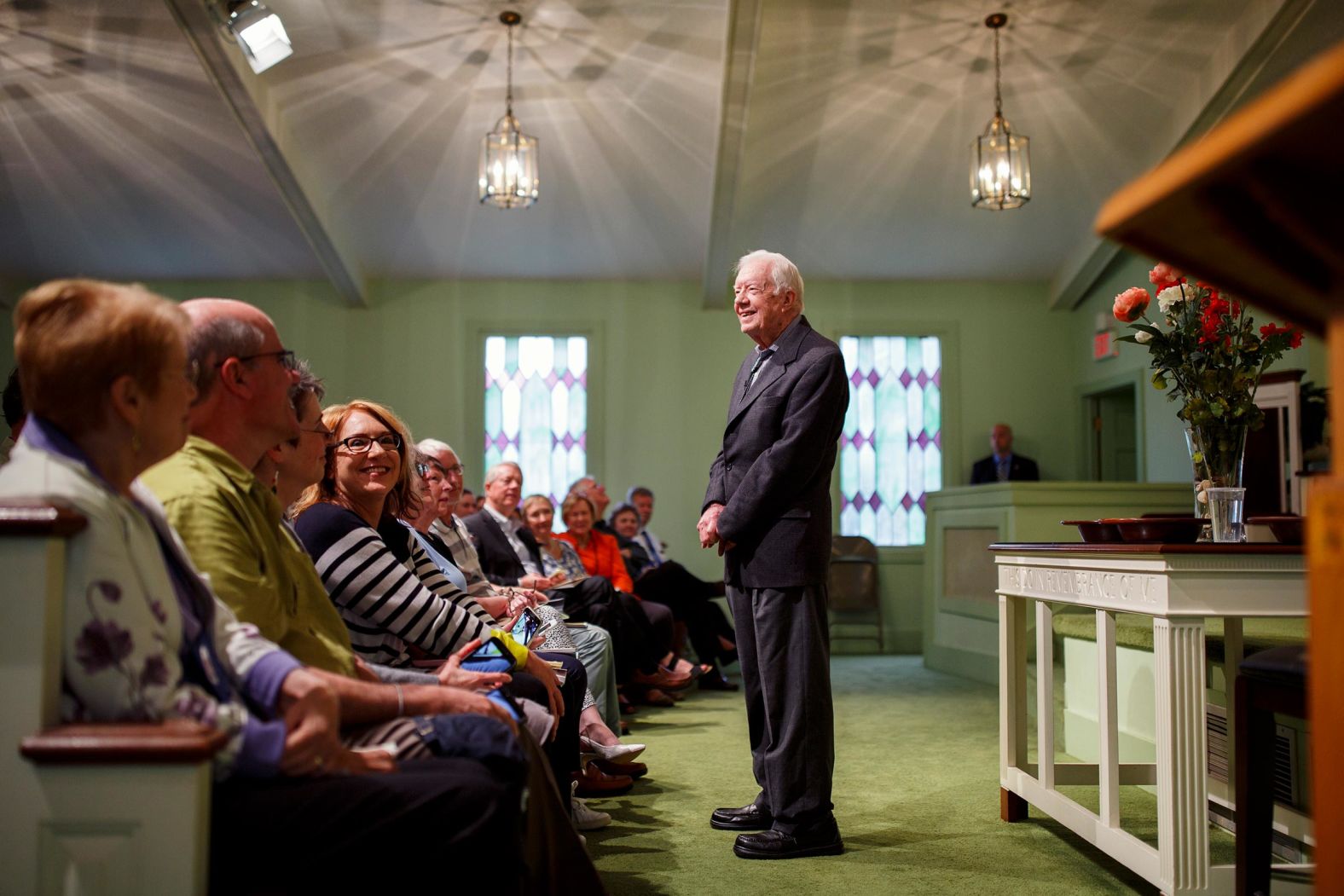 Former President Jimmy Carter greets visitors before teaching a Sunday school class at Maranatha Baptist Church in Plains, Ga., April 15, 2018. 