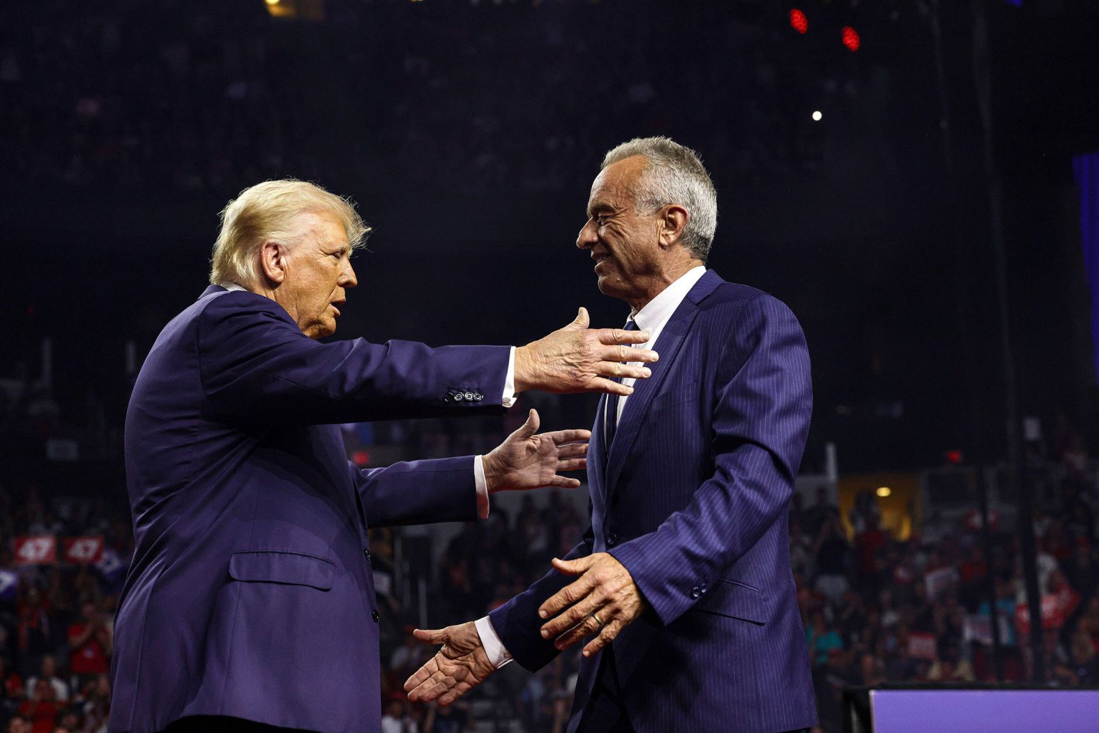 Trump, left, greets Robert F. Kennedy Jr., at a campaign rally in Glendale, Arizona, on August 23. Kennedy had just suspended his independent campaign and <a href="index.php?page=&url=https%3A%2F%2Fwww.cnn.com%2F2024%2F08%2F23%2Fpolitics%2Frfk-jr-suspends-campaign%2Findex.html">threw his support behind Trump</a>.