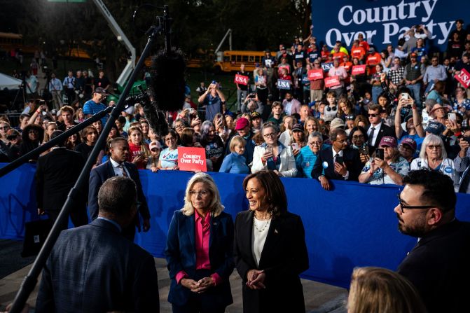 Cheney and Vice President Kamala Harris greet attendees during a Harris campaign event in Ripon, Wisconsin, in October 2024. Cheney said <a href="index.php?page=&url=https%3A%2F%2Fwww.cnn.com%2F2024%2F10%2F03%2Fpolitics%2Fliz-cheney-harris-campaign-stop%2Findex.html">she would be "proudly" casting her vote for Harris</a>, the Democratic presidential nominee.