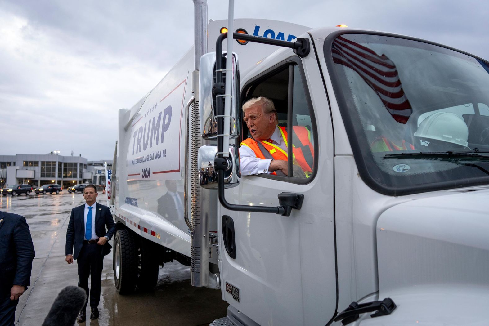 Trump speaks from a garbage truck in Green Bay, Wisconsin, in October 2024. <a href="index.php?page=&url=https%3A%2F%2Fwww.cnn.com%2F2024%2F10%2F31%2Fpolitics%2Fgarbage-truck-donald-trump-wisconsin%2Findex.html">Trump was seizing on a garbled remark by Biden</a> that seemed to insult Trump voters as “garbage.” Biden has personally denied calling Trump supporters “garbage,” saying his comment on a video call was misinterpreted. The White House, on cleanup duty, insisted the president was only talking about one person, the comedian who called Puerto Rico a “floating island of garbage” during the Trump rally at Madison Square Garden.