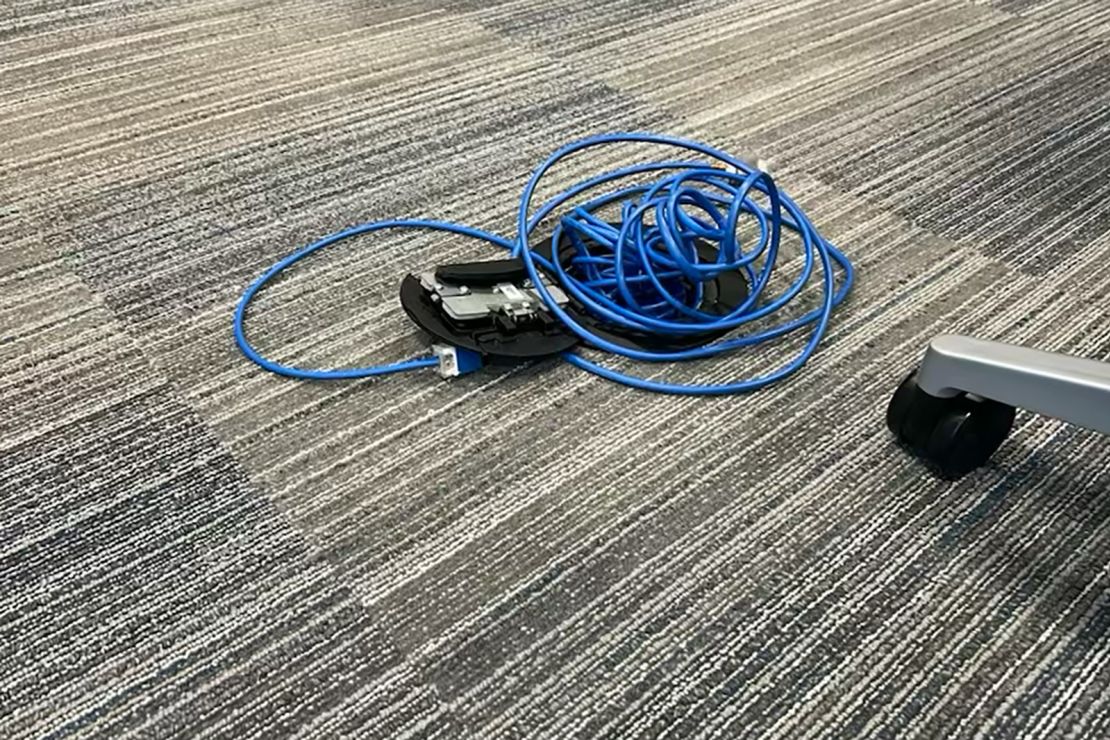 Ethernet cords lay on the floor at a Department of Education office in Dallas. 