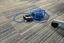 Ethernet cords lay on the floor at a Department of Education office in Dallas. 