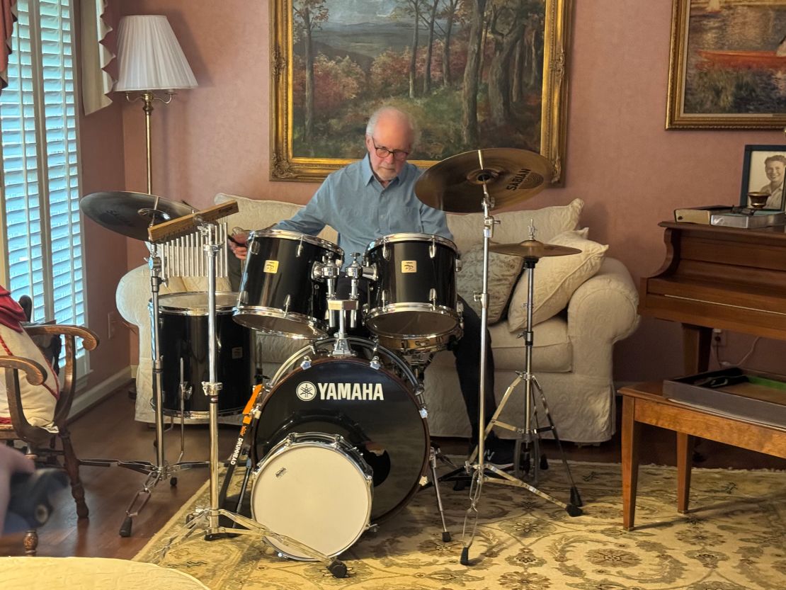 Jan Gardner plays drums at his home in Dunwoody, Georgia.