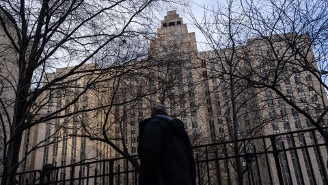 A man walks past the Manhattan Criminal Courthouse on April 3, 2023.